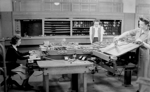In addition to hand computing on paper, Kay McNulty, Alyse Snyder, and Sis Stump, above, operated a Bush differential analyzer machine, a mechanical calculating machine developed in the 1930s, which helped crunch the enormous amount of data that went into establishing range projections for a variety of different field artillery pieces.