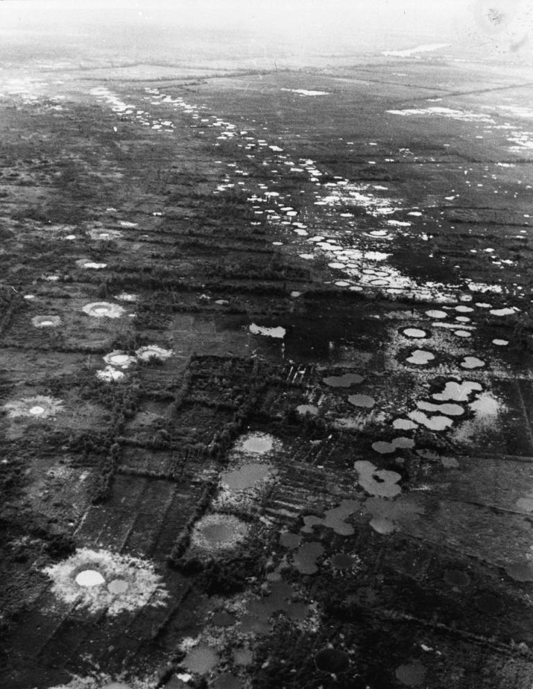 During Operation Rolling Thunder, U.S. planes carpeted the Vietnam landscape with "dumb bombs," which were dropped in a string, or “train.” Photo interpreters counting bomb craters and measuring distances derived their accuracy. 