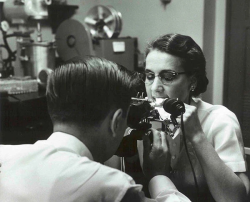 A technician checks Crest’s tooth cleaning ability using a microscope and ultraviolet light. Procter & Gamble